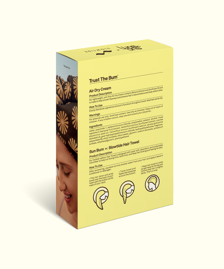 Yellow product box featuring Air Dry Cream & Hair Towel Kit with instructions and illustrations for hair care use, showcasing an image of a person with curly hair wearing a floral pattern. Includes step-by-step hair wrapping guide. By Sun Bum.